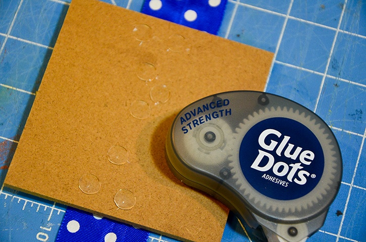 glue-dots-usa-banner-adhering-tiles-to-ribbon.jpg