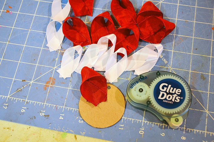 glue-dots-ribbon-ornament-adhering-ribbon-to-cardboard-circle.jpg