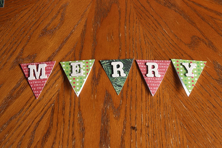 glue-dots-merry-gift-wrap-banner-letter-thickers-on-banner-pieces.jpg