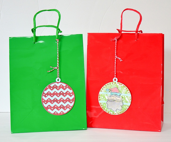 glue-dots-holiday-gift-tags-on-bags.jpg