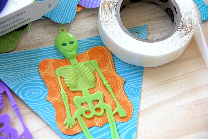 glue-dots-halloween-skeleton-banner-gluing-skeletons-with-all-purpose-dots.jpg