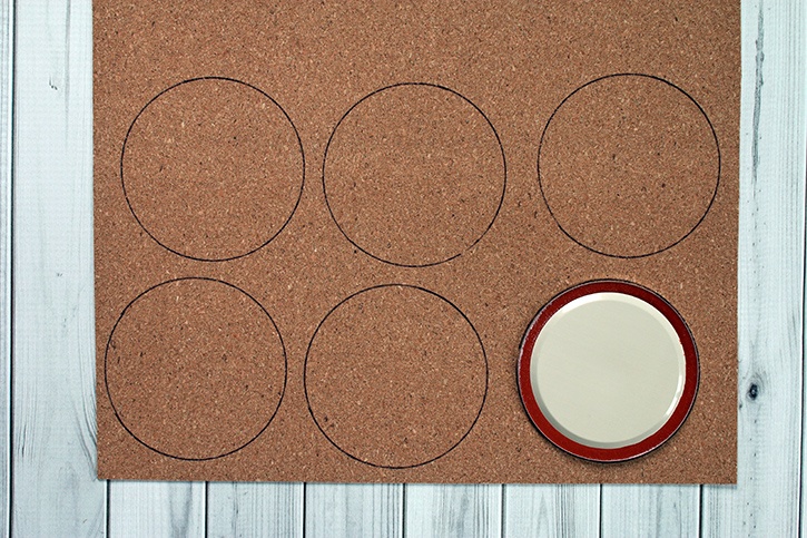 glue-dots-halloween-mason-jar-lid-coasters-traced-on-cork.jpg