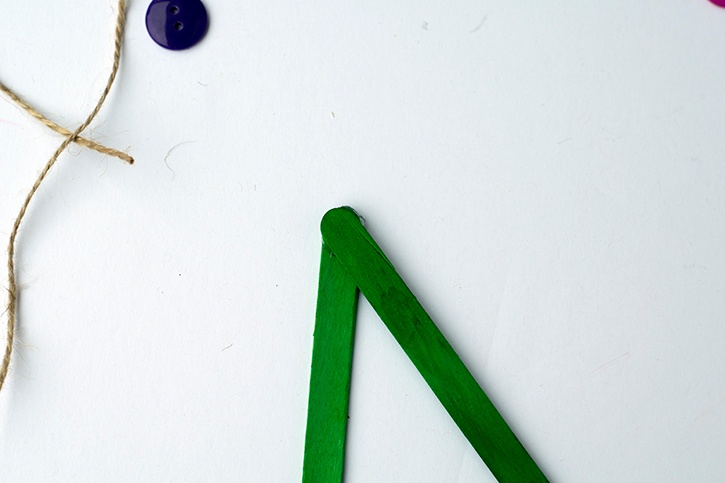 glue-dots-craft-stick-christmas-tree-button-ornament-craft-sticks-glued-together.jpg