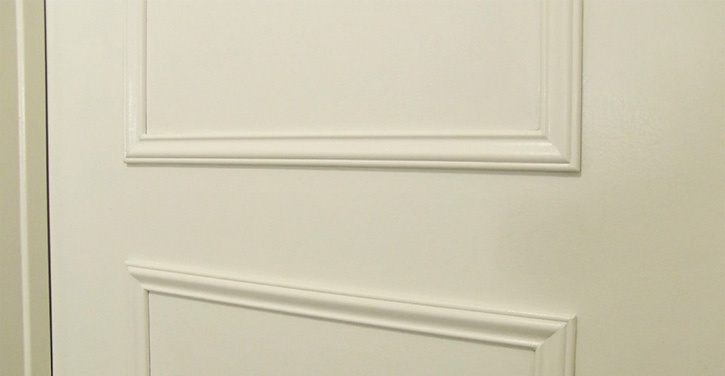 Decorative trim added to a plain door with Glue Dots HybriBond Repositionable Mounting Tape